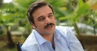 �nl� oyuncu Ufuk �zkan